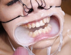 Taking cum in the face and the mouth